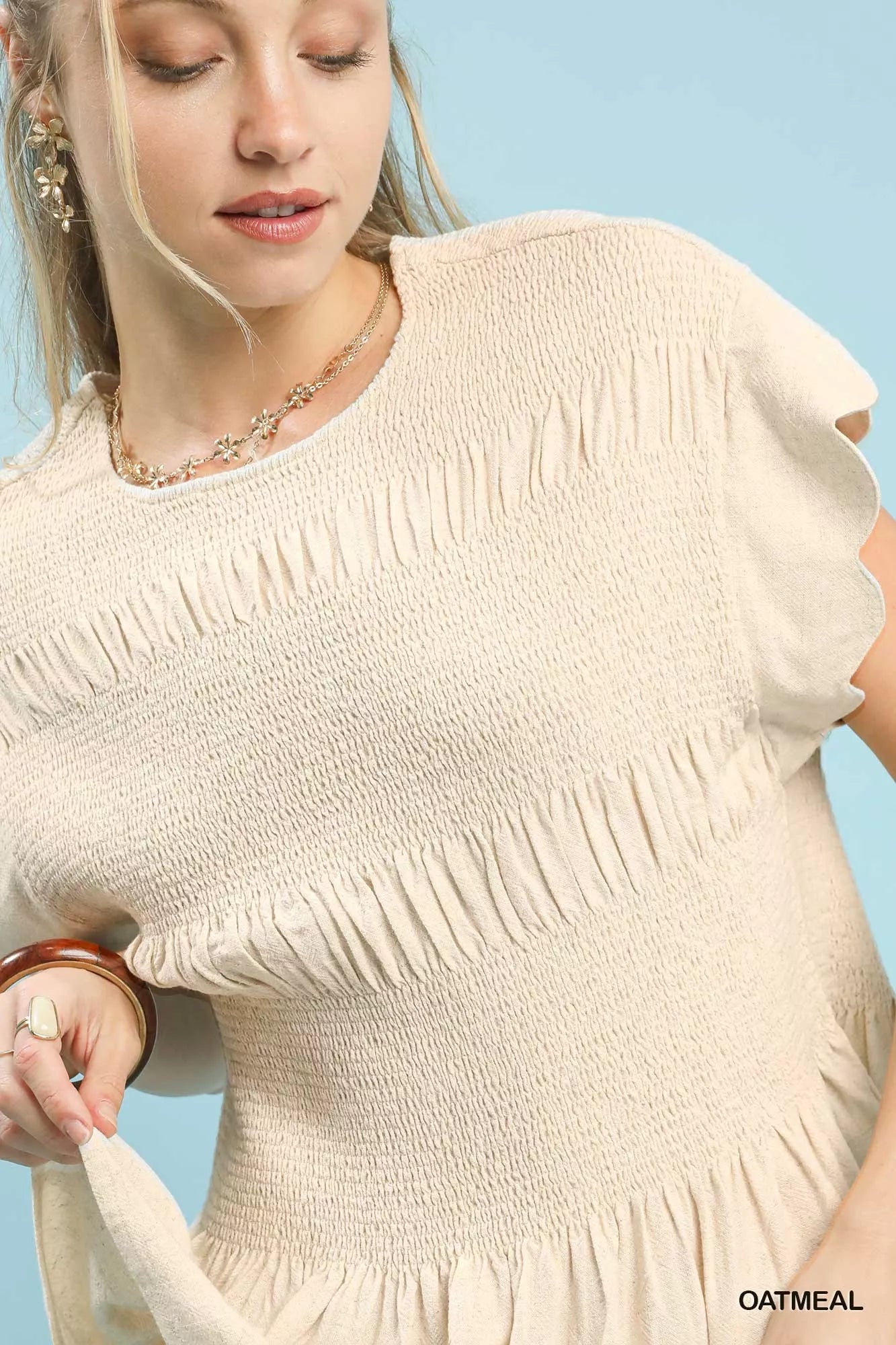 Umgee Linen Blend Smocked Peplum Blouse